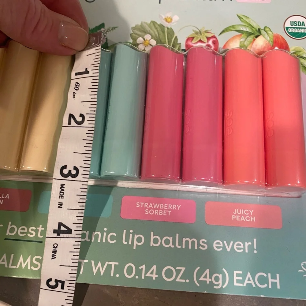 9 organic 100% natural EOS lip balms! A variety of colors and scents- see pic💋